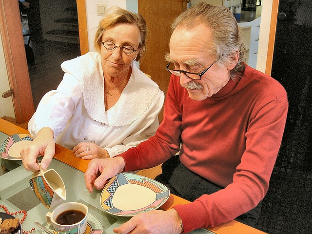 A senior citizen with Alzheimer's and his caregiver A senior citizen with Alzheimer's and his caregiver